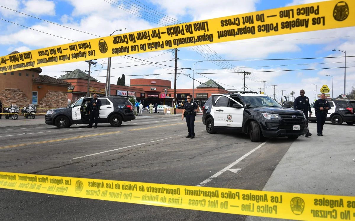 Police monitor a roadblock in front of the late Nipsey Hussle’s The Marathon Store in Los Angeles, California on April 2, 2019. (AFP)
