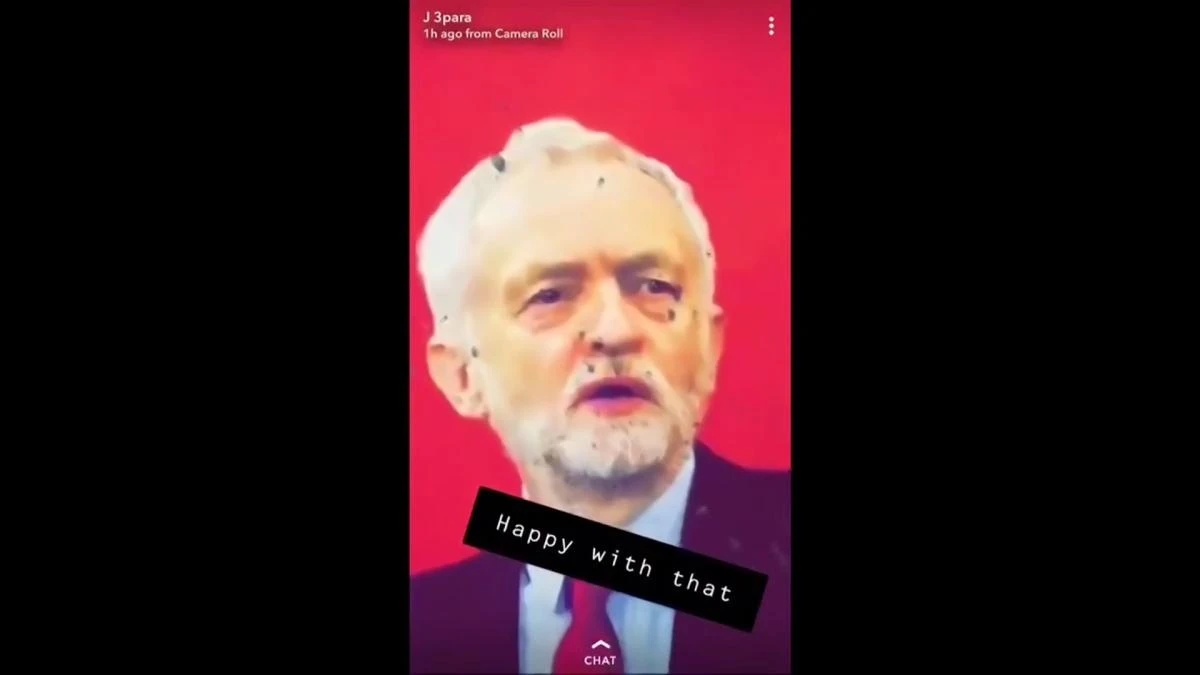 In this undated photo made from video, a photo of Britain's Labour Party leader Jeremy Corbyn is seen with bullet holes at a British army base in Kabul, Afghanistan. (AP)