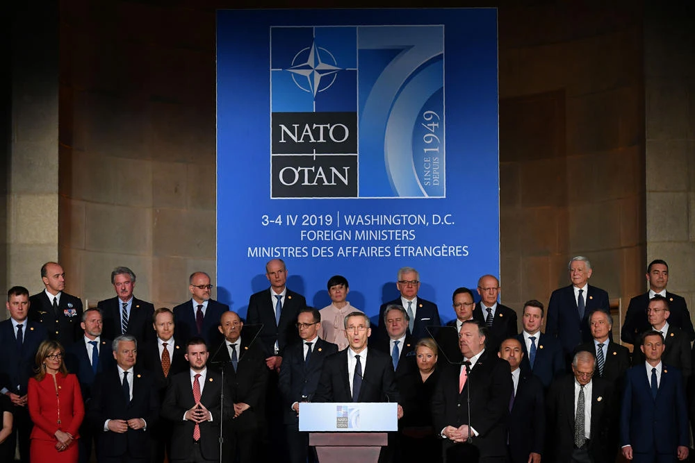 NATO Secretary-General Jens Stoltenberg (C) speaks during a reception celebrating NATO's 70 Anniversary at the Andrew W. Mellon Auditorium in Washington on April 3, 2019. (AFP / MANDEL NGAN)