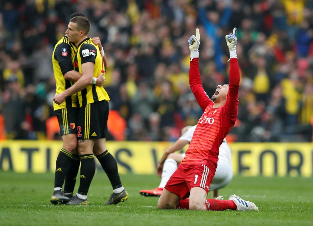 Watford's Heurelho Gomes celebrates after the FA Cup semifinal match between Watford and Wolverhampton Wanderers at the Wembley Stadium in London on Sunday. (REUTERS/David Klein)
