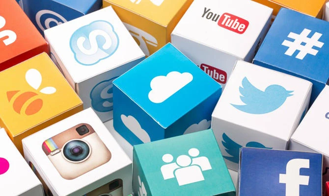 Paper cubes with Popular social media services icons. (Supplied)