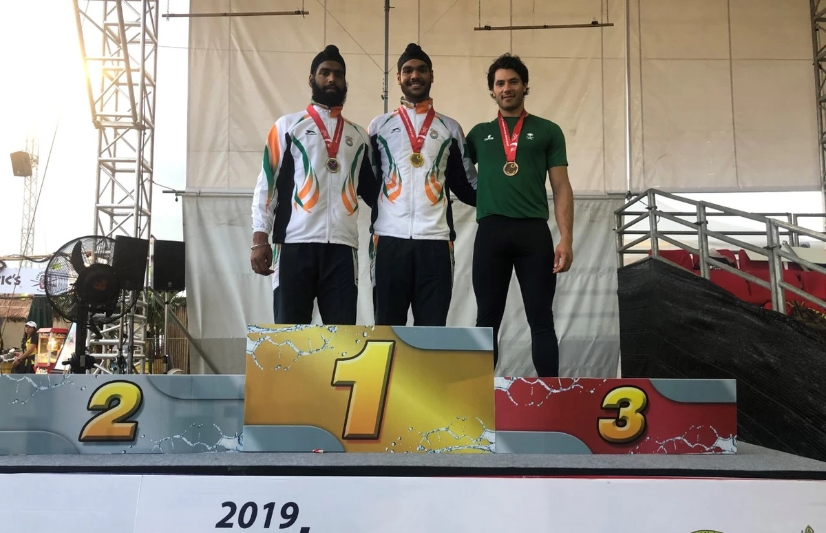 Saudi Husein Alireza, right, on the podium of the Asian Indoor Rowing Championship 2019 in Bangkok. (Photo supplied)