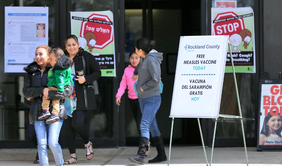 In this March 27, 2019 file photo, signs advertising free measles vaccines and information about measles are displayed at the Rockland County Health Department, in Pomona, New York. (AP)