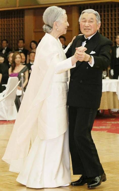 In this file photo taken on April 12, 2013 Japanese Emperor Akihito (R) and Empress Michiko dance during a charity dance party in Tokyo. (AFP)