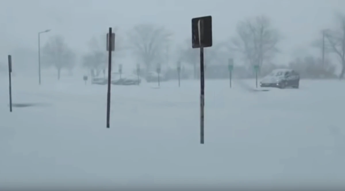 Heavy snow disrupted ground and air travel on Wednesday in the central US. (Screen grab from AP video)