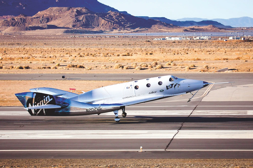 The Virgin Spaceship ‘Unity’ touches down in the Mojave Desert, California, after its first free test flight. (AFP)