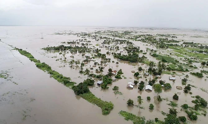 This file handout picture released by the United Nations World Food Programme on March 20, 2019, shows an aerial view of flooded houses, after the tropical cyclone Idai made landfall near the heavily-populated Mozambican port city of Beira. (AFP)