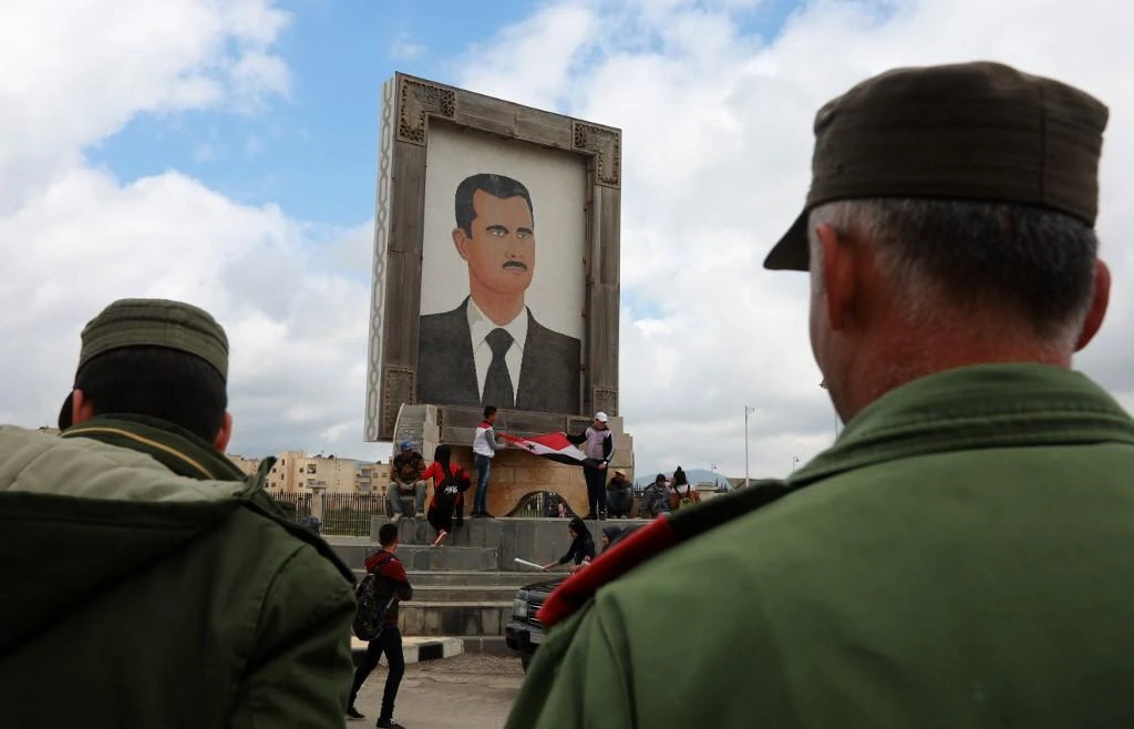 Some of Assad's supporters regard his family rule as the base of stability in Syria. (AFP/File)
