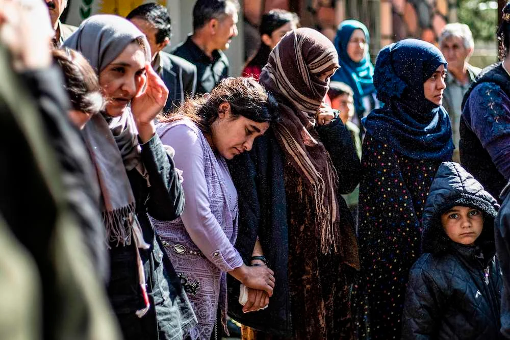 Syrian Kurds repatriated 25 women and children from Iraq’s Yazidi minority after freeing them during the final push against Daesh. (AFP)