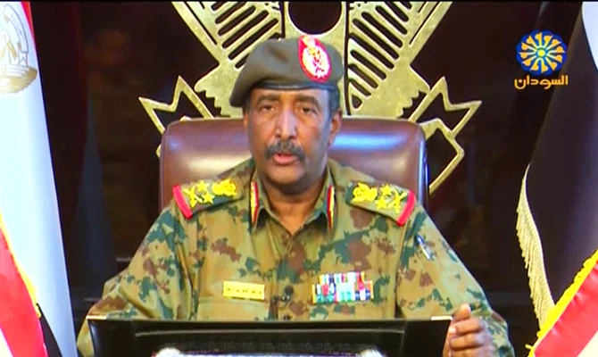 The new head of Sudan's military transitional council, Lieutenant General Abdel Fattah Al-Burhan Abdelrahman making a televised address on Saturday. (Screengrab from Sudan TV