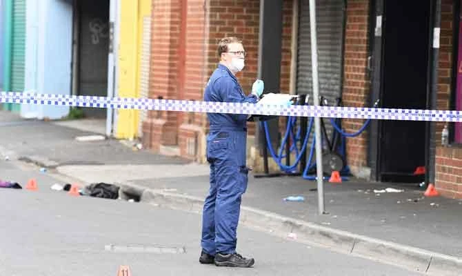 A Victoria Police personnel works at the scene of a multiple shooting outside Love Machine nightclub in Prahran, Melbourne, Australia April 14, 2019. (REUTERS)