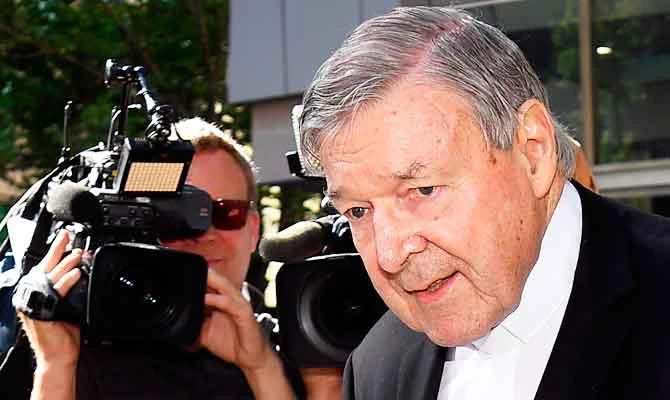 Cardinal George Pell walks to a car in Melbourne on December 11, 2018. (AFP)