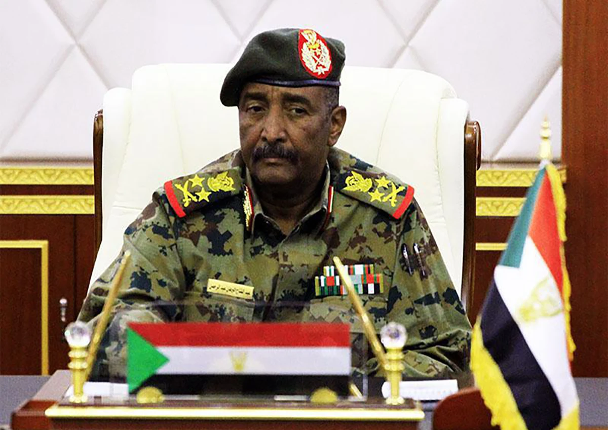 A handout picture released by the Twitter account of the official Sudan News Agency (SUNA) on April 16, 2019 shows Lieutenant General Abdel Fattah al-Burhan, the new chief of the military council in Sudan attending a session in the capital Khartoum. (AFP)