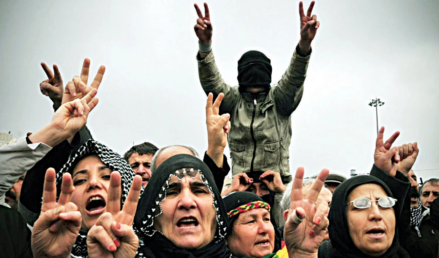 Kurdish protesters take part in a demonstration in Istanbul after Turkey’s electoral board barred prominent Kurdish candidates from standing in elections. (AFP)