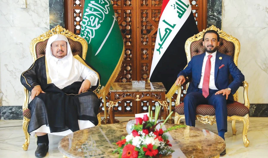 Saudi Shoura Council Speaker Dr. Abdullah Al-Asheikh meets Iraqi Parliament Speaker Mohamed Al-Halbousi in Baghdad on Saturday. (Reuters)