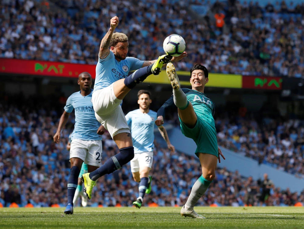 Manchester City's Kyle Walker in action with Tottenham's Son Heung-min at the Etihad Stadium, Manchester, Britain, on April 20, 2019. (REUTERS/Phil Noble)