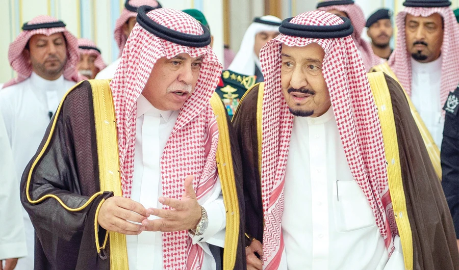 King Salman with Minister of Commerce and Investment Dr. Majid bin Abdullah Al-Qassabi at Al-Yamamah Palace in Riyadh on Monday. (SPA)