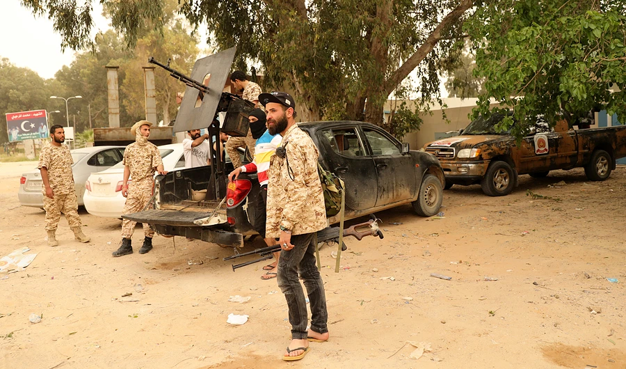 Libyan force slows Tripoli push over concerns for civilians