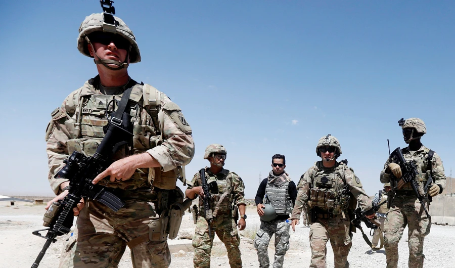 In this file photo, US troops patrol at an Afghan National Army (ANA) Base in Logar province, Afghanistan. (Reuters)