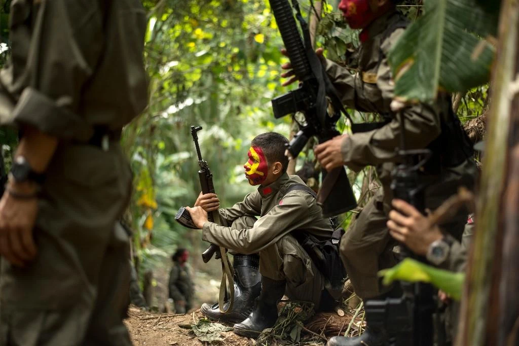 The New People’s Army, the armed wing of the Communist Party of the Philippines, has waged a guerrilla campaign that has killed up to 40,000 people since 1969. (AFP)