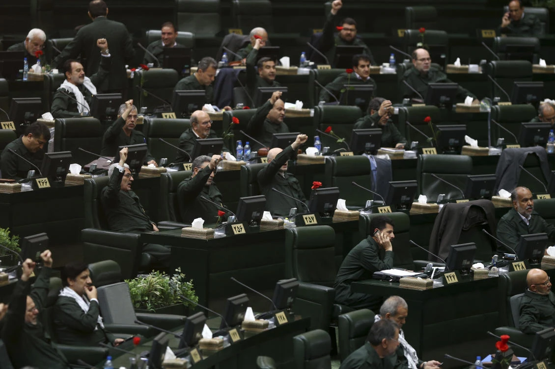 Iranian lawmakers chant slogan during an open session of parliament in Tehran on April 9, 2019. (Islamic Consultative Assembly News Agency/AP)