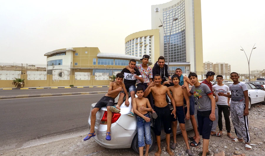Life must go on for Libyans despite war on their doorstep