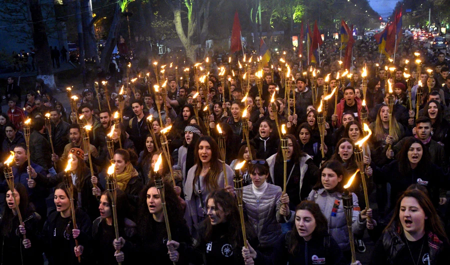 What led to the genocide of Armenians by the Ottomans