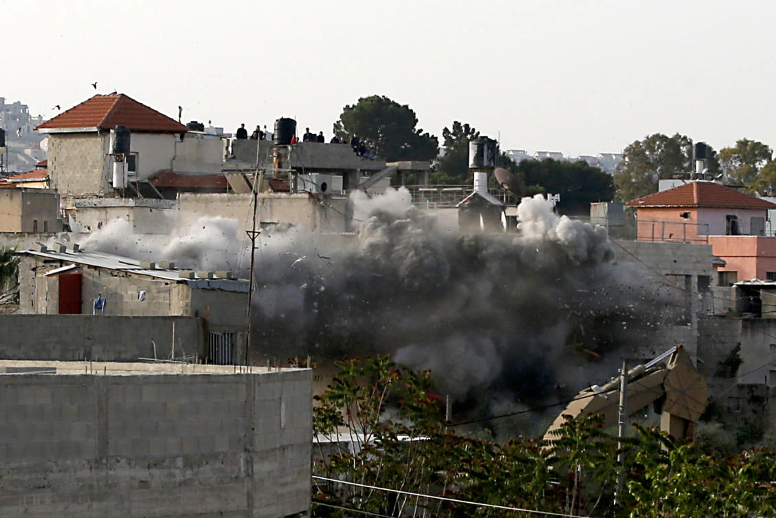 Israeli forces blow up the family house of Palestinian assailant Omar Abu Laila, in Az-Zawiya village, in the Israeli-occupied West Bank, April 24, 2019. (AFP)