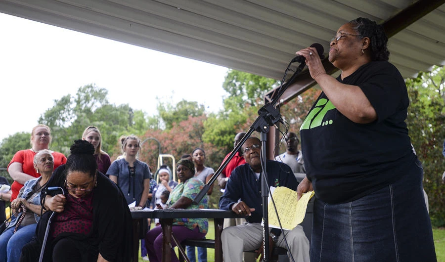 Betty Boatner, a sister of James Byrd Jr., talks to the crowd during a prayer vigil at James Byrd Memorial Park in Jasper, Texas, on April 24 ,2019. (Ryan Welch/The Beaumont Enterprise via AP)