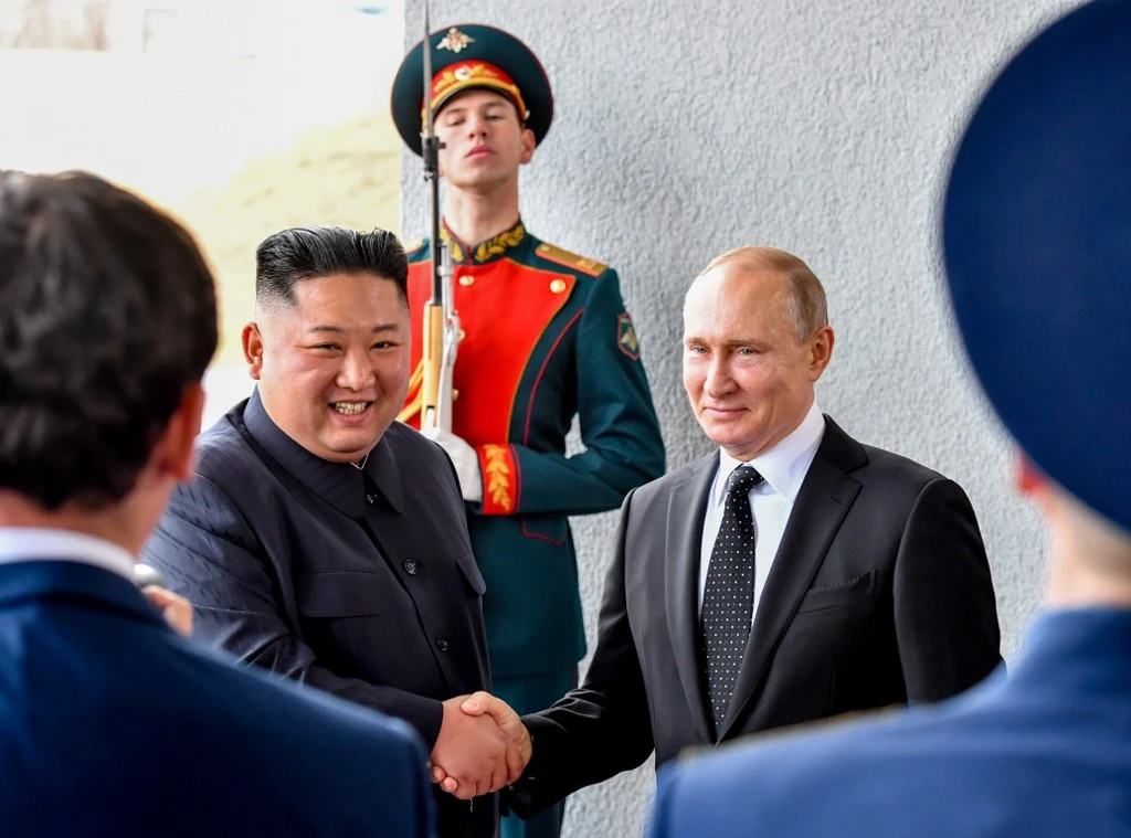 Russian President Vladimir Putin, right, and North Korea’s leader Kim Jong Un shake hands during their meeting in Vladivostok on Thursday, April 25, 2019. (AFP)