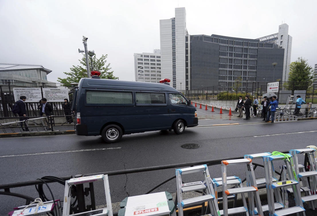 Reporters stake out Tokyo Detention Center where former Nissan Chairman Carlos Ghosn is detained on Thursday, April 25, 2019. (AP)