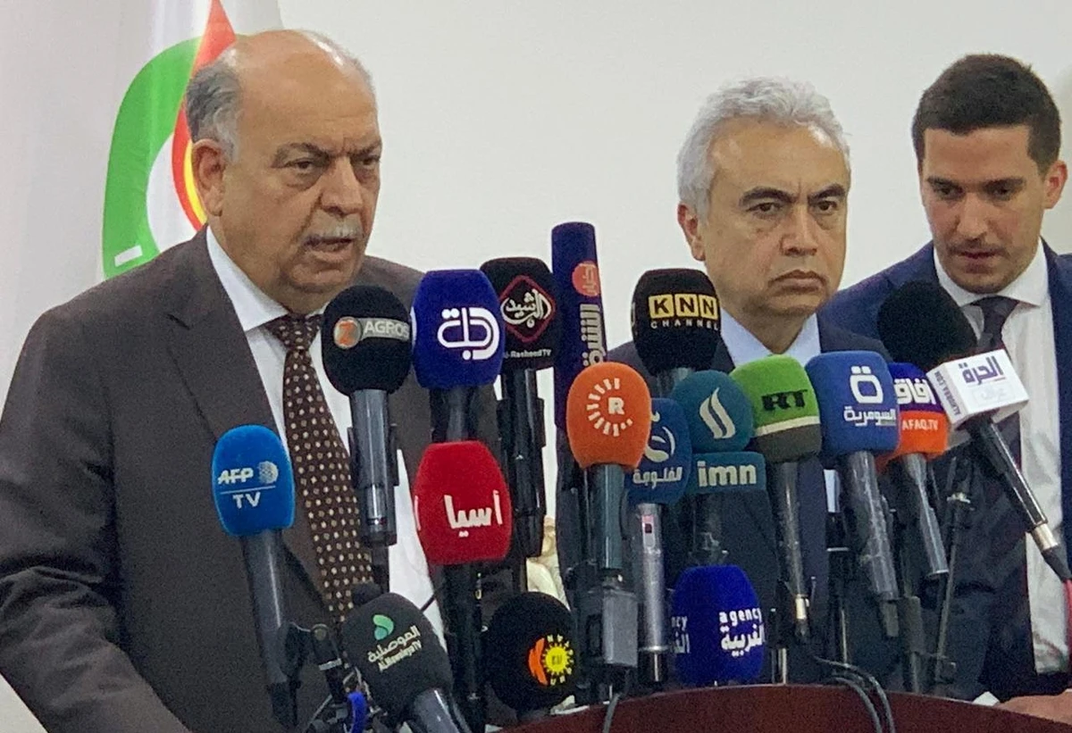Iraqi oil minister Thamer Ghadhban, left, and International Energy Agency chief Fatih Birol speak during a joint news conference in Baghdad on April 25, 2019. (Reuters)