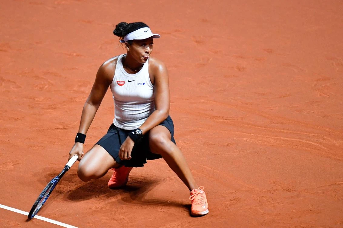 Japan’s Naomi Osaka reacts after a point against Taiwan’s Su-Wei Hsieh during their round-of-16 match at the WTA Tennis Grand Prix in Stuttgart, Germany. (AFP)