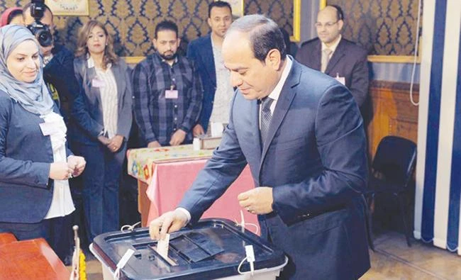 Egyptian President Abdel Fattah El-Sisi is seen voting in Cairo. (AP)