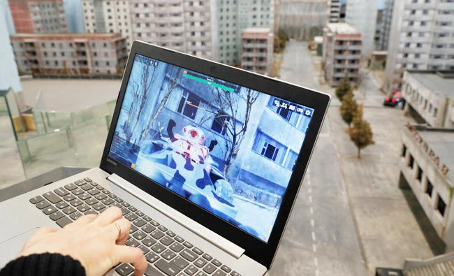 Co-founder of the 'Isotopium: Chernobyl' game Alexey Fateyev shows the game's interface at its location in Brovary, Ukraine April 25, 2019. (REUTERS)