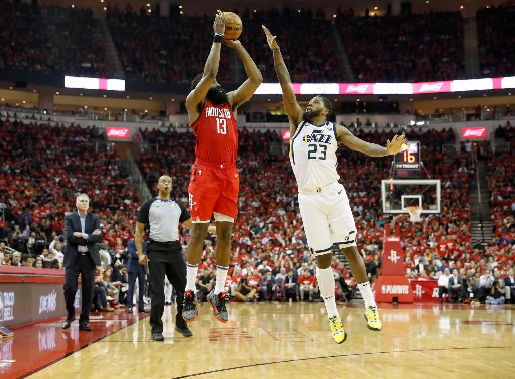 James Harden of the Houston Rockets takes a three-point shot defended by Royce O'Neale of the Utah Jazz during Game Five of the first round of the 2019 NBA Western Conference Playoffs between the Houston Rockets and the Utah Jazz at Toyota Center on April 24, 2019 in Houston, Texas. (Tim Warner/Getty Images/AFP)