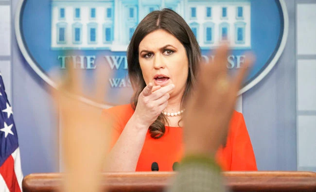 White House press secretary Sarah Huckabee Sanders gestures as she answers questions while speaking to the media during the daily briefing in the Brady Press Briefing Room of the White House, Wednesday, Nov. 1, 2017. (AP)