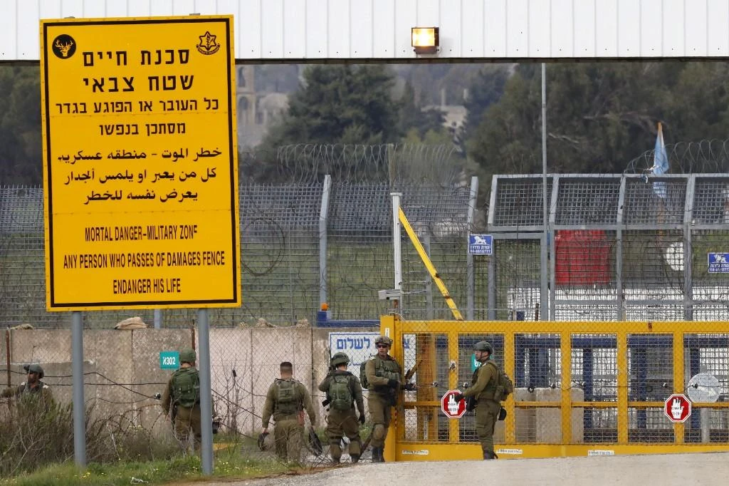 The prisoners were transferred to the International Committee of the Red Cross at Quneitra crossing. (AFP/File)