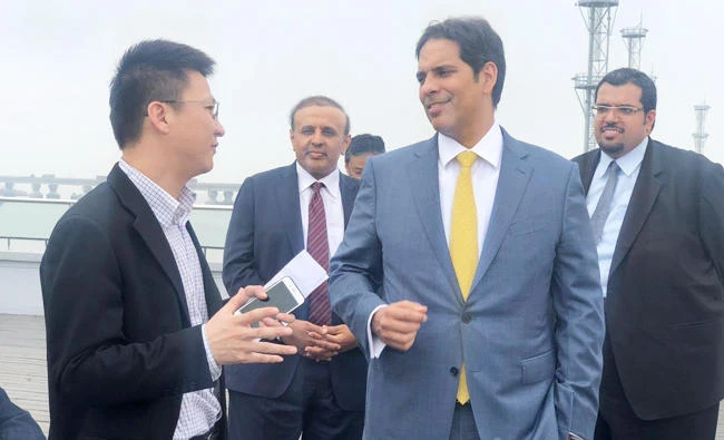 Transport Minister Nabeel Al-Amoudi visits the Port of Shanghai. (SPA)