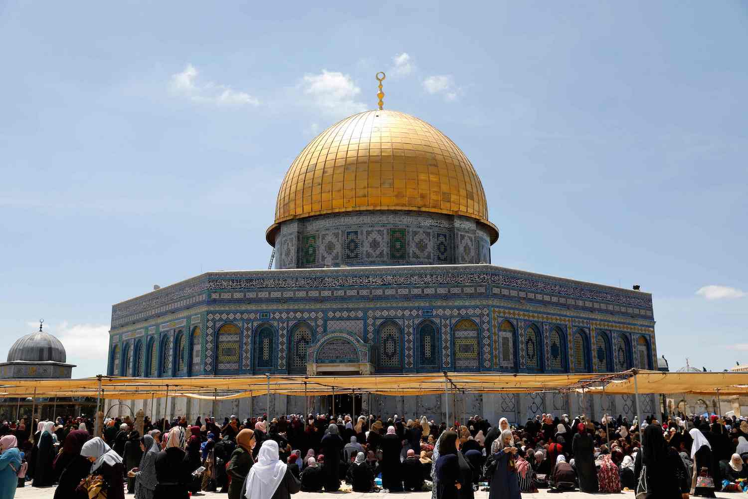 Palestinian Muslim worshippers pray in the Al-Aqsa Mosque compound in Jerusalem on May 10, 2019 on the first Friday prayers of the holy fasting month of Ramadan. (AFP)