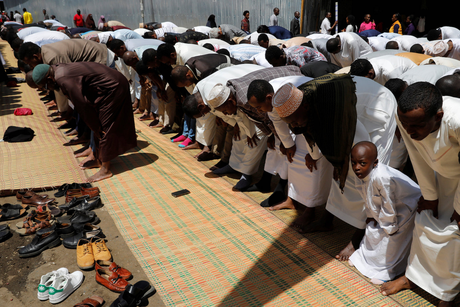 Muslim worshipers attend prayers on the first Friday of Ramadan outside Jamia the mosque in Nairobi, Kenya, May 10 , 2019. (Reuters)