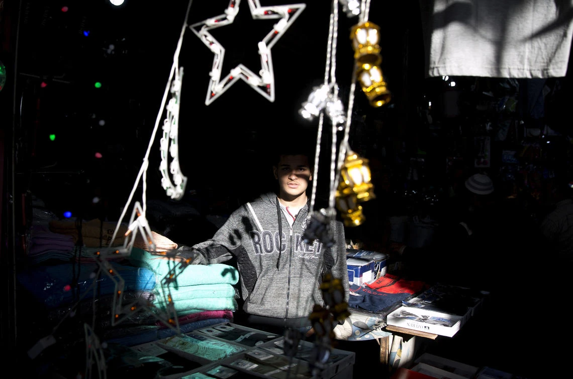 Palestinians shop for traditional Ramadan lanterns for the month of Ramadan, at the main market in Gaza City, Tuesday, May. 7, 2019. Muslims throughout the world are preparing to celebrate Ramadan, the holiest month in the Islamic calendar, refraining from eating, drinking, smoking and sex from sunrise to sunset. (AP Photo/Hatem Moussa)