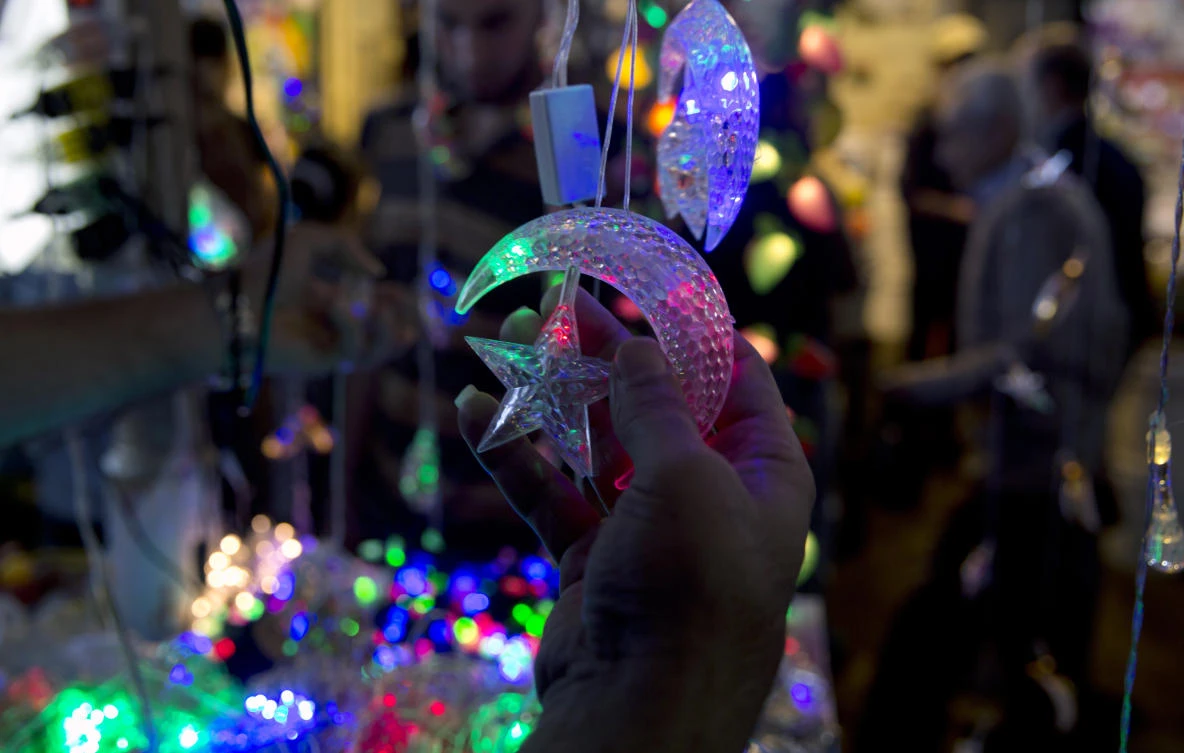 Palestinians shop for traditional Ramadan lanterns for the month of Ramadan, at the main market in Gaza City, Tuesday, May 7, 2019. Muslims throughout the world are preparing to celebrate Ramadan, the holiest month in the Islamic calendar, refraining from eating, drinking, smoking and sex from sunrise to sunset. (AP Photo/Hatem Moussa)