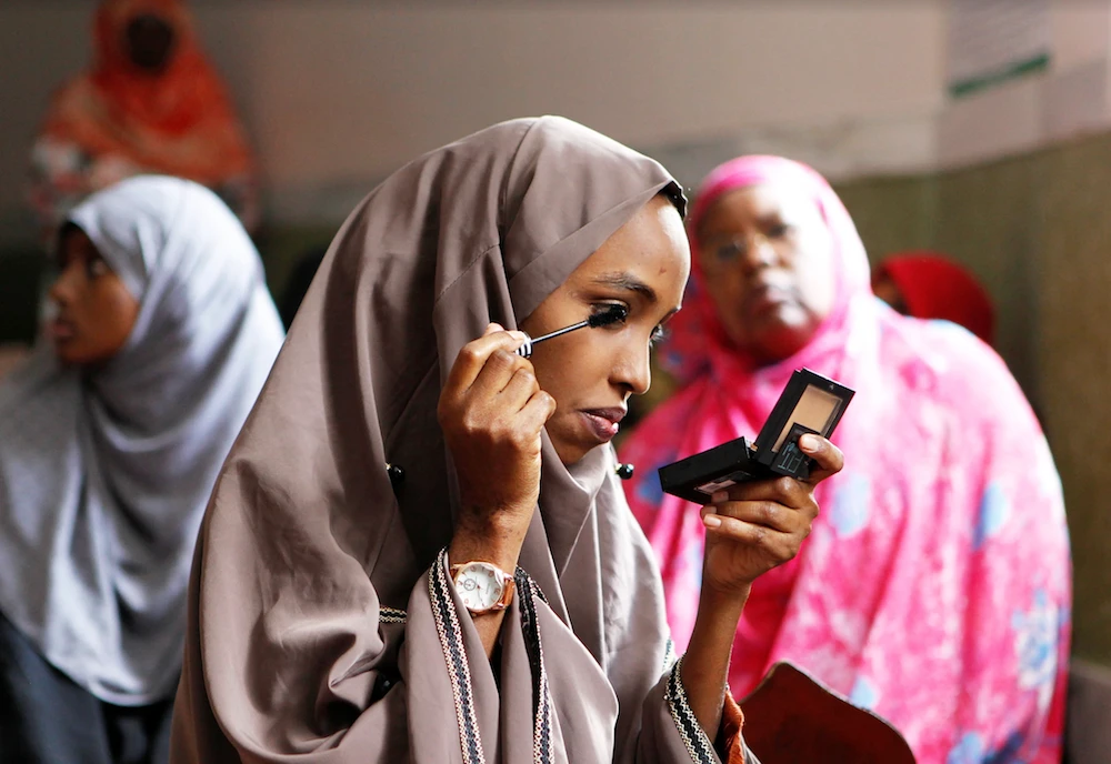 A Muslim woman prepares for the start of the Friday prayers during the holy fasting month of Ramadan inside Jamia mosque in Nairobi, Kenya May 17, 2019. (Reuters)