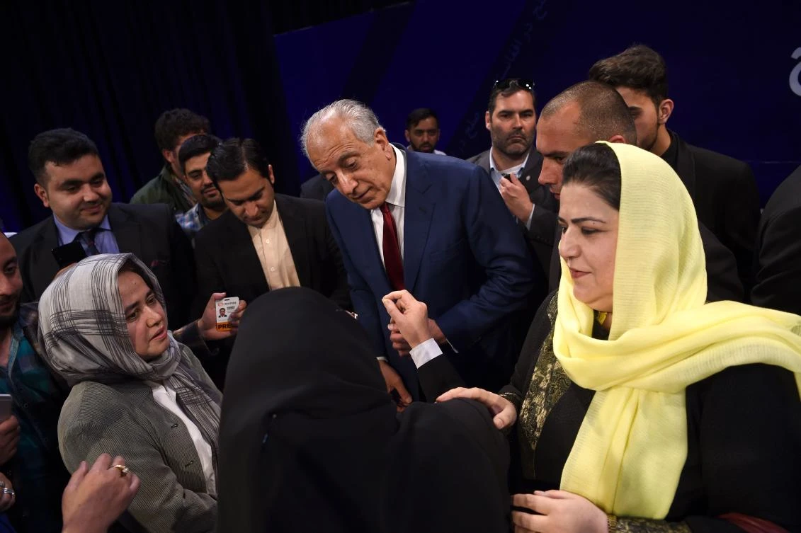 US special representative for Afghan peace and reconciliation Zalmay Khalilzad (C) interacts with the audience after a forum talk with Afghan director of TOLO news Lotfullah Najafizada, at the Tolo TV station in Kabul on April 28, 2019. (AFP/Wakil Kohsar)