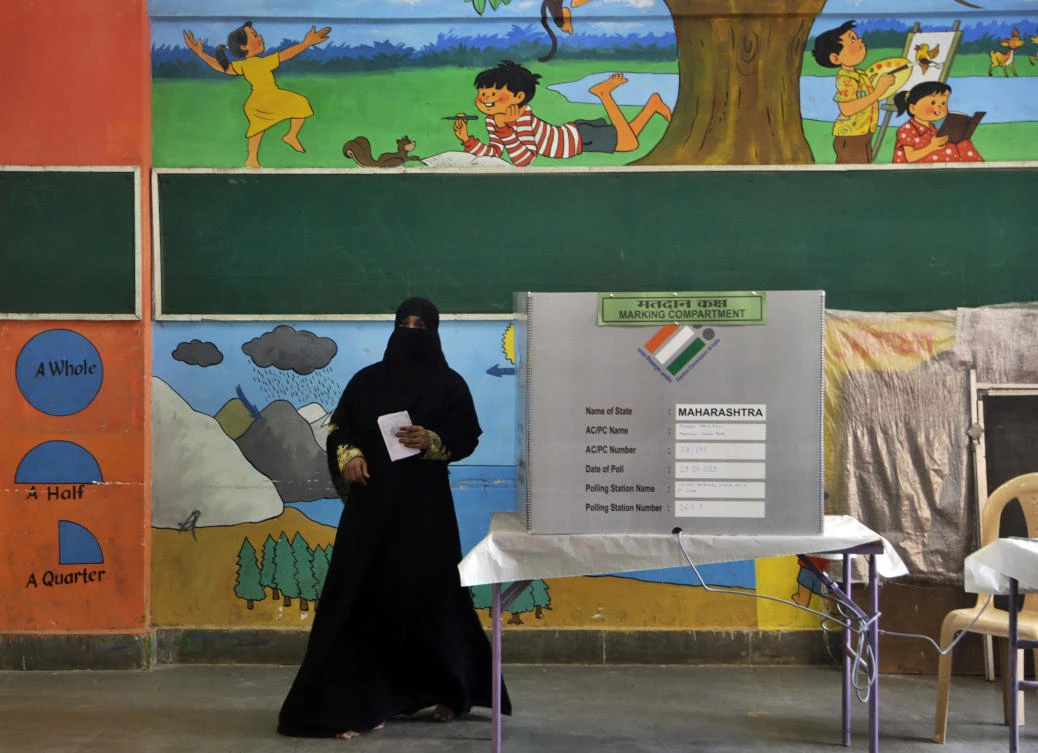 An Indian Muslim woman walks back after casting her vote in Mumbai, India, Monday, April 29, 2019. (AP/Rajanish Kakade)