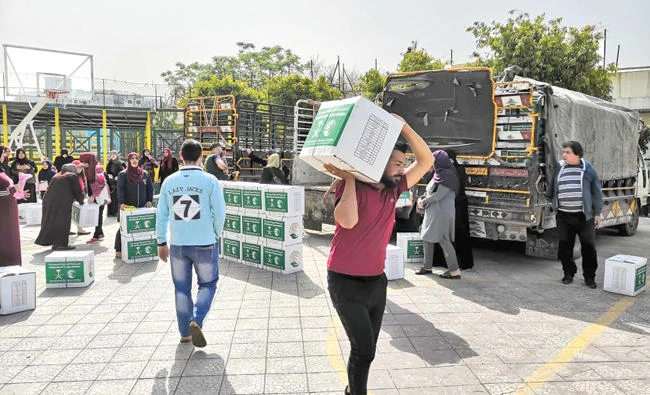 A KSRelief team distributed food baskets among Palestinian and Syrian refugees and needy Lebanese families in parts of Lebanon. (SPA)