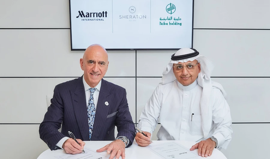 Alex Kyriakidis, president and managing director, Middle East and Africa, Marriott International, and Qasim bin Abdul Ghani Al-Maimani, CEO of Taiba, at the signing ceremony.