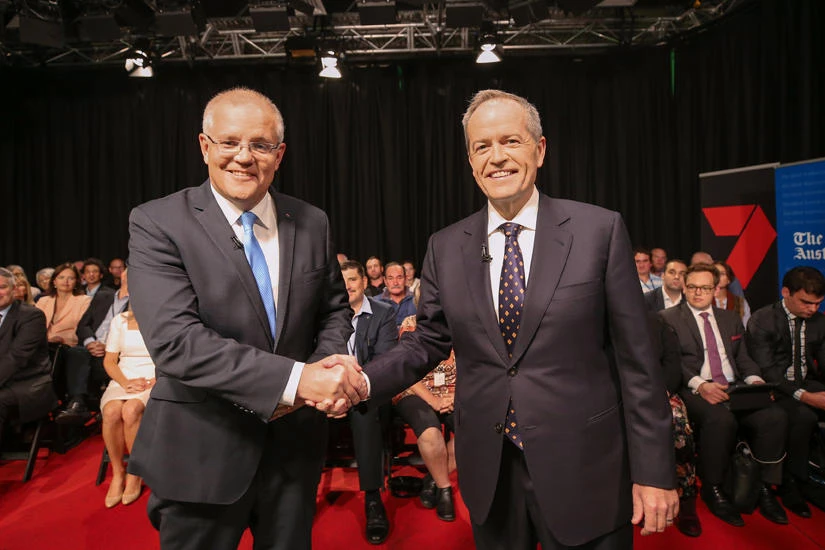 Australian Prime Minister Scott Morrison and Opposition Leader Bill Shorten shake hands before the first leaders forum at the Seven West Media Studios in Perth, Australia, on April 29, 2019. (AAP Image/ The West Australian POOL, Nic Ellis/via REUTERS)