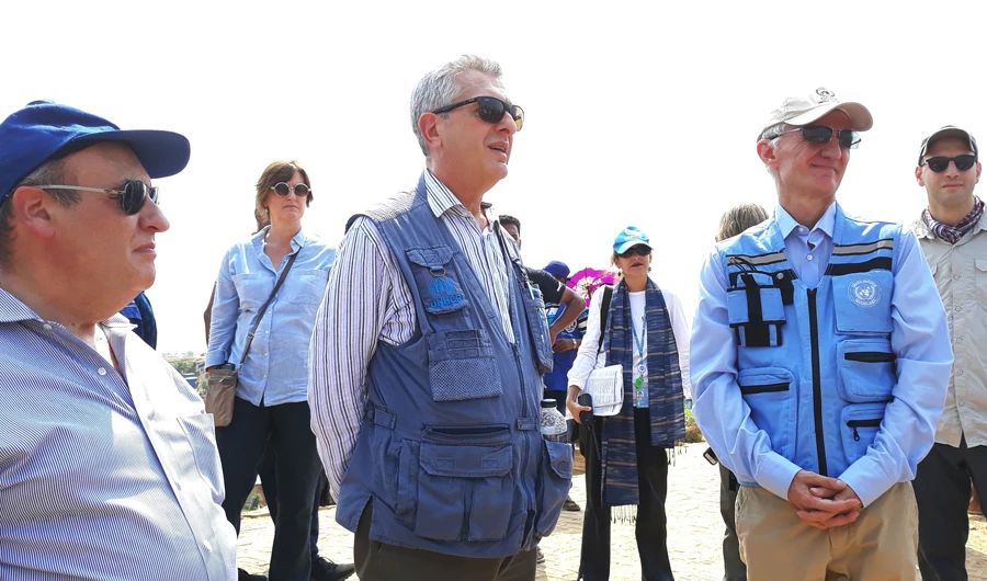 United Nations High Commissioner for Refugees (UNCHR) Filippo Grandi (C) look on next to other members of the delegation of United Nations organizations during their visit to a Rohingya camp in Ukhia, near Cox's Bazar in Bangladesh on April 26, 2019. (AFP)